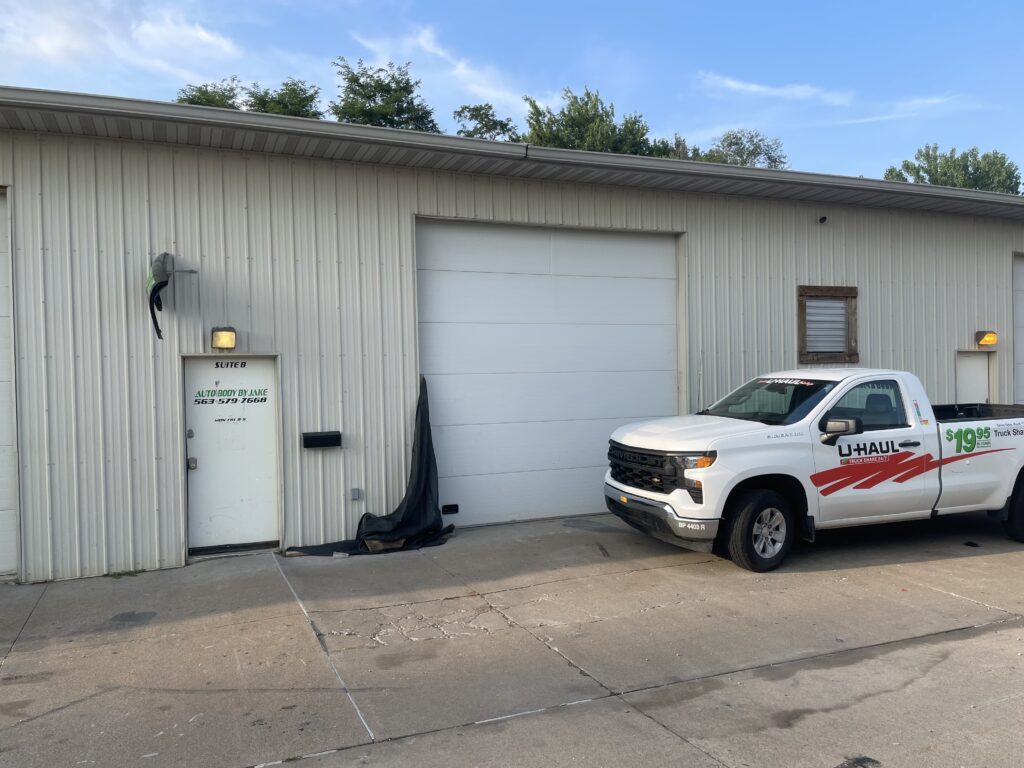 48′ x 50′ x 14′ Heated warehouse with regular door and two 11′ x 11′ roll-up doors (only one shown) can be used for business or as a storage unit in Davenport, IA