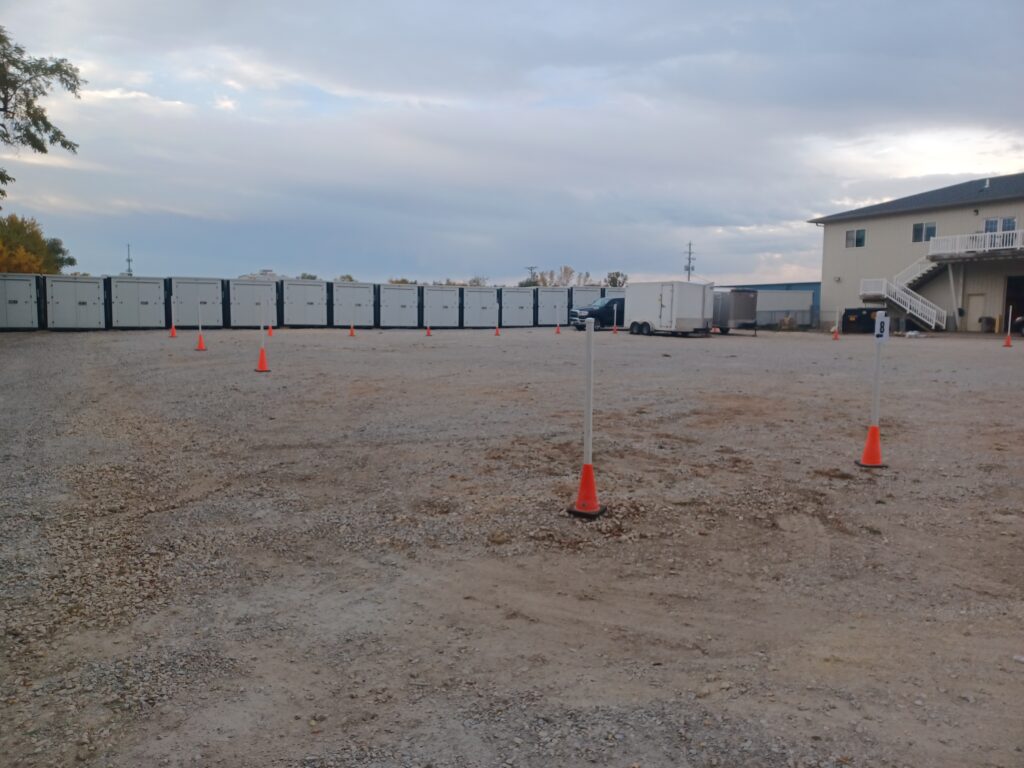 RV & Boat Storage Area in Davenport, Iowa at Davenport Storage Center with posts showing where to park.